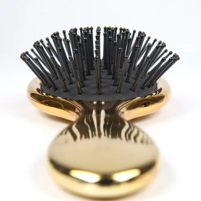 Disney Minnie arany fésű termékfotó