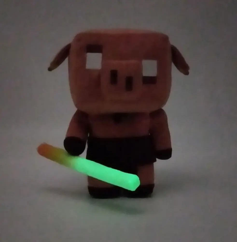 Minecraft Legends Piglin elektromos plüss figura 29 cm termékfotó